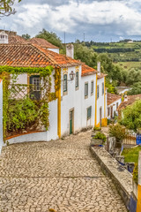 View of a Portuguese vernacular buildings on medieval village inside the fortress and Luso Roman castle of Óbidos