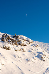 The Moon above the freeride zone, Canazei, Italy