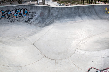 skatepark made of concrete with graffiti