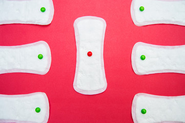 women's sanitary pads on pink background