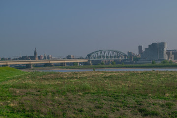 Dutch passenger train passing a bridge
