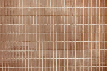 Old brown tile wall background texture