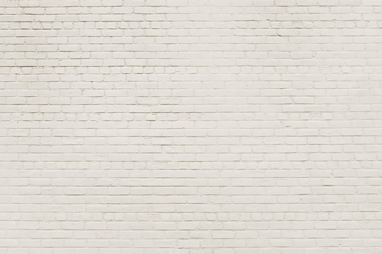 Old white brick wall background texture © issalina