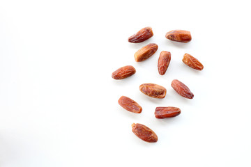 Creative layout made of dried date isolated on white background