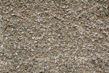 Abstract texture of a gravel wall background