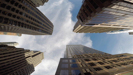 Vertical View of Modern High Rise Skyscraper Office Buildings in Business Finance District