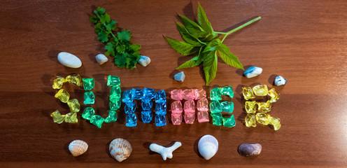 Summer. Summer colored stones. Summer seashell pebbles.