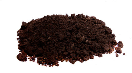 a pile of black soil on an isolated white background.