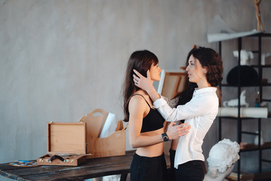 Two girls in each other's tender embraces