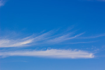 vivid blue sky nature background with white high clouds 