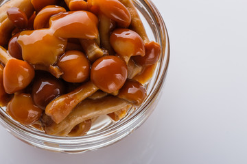 pickled vegetables on a white acrylic background