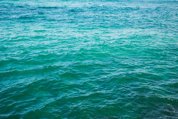 tropic sea aquamarine water background surface  with small waves