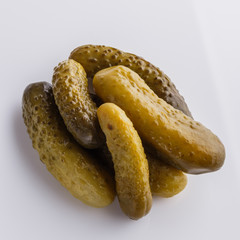 pickled vegetables on a white acrylic background