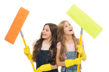 Helpful kids cleaning together. Girls with protective gloves and mops ready for cleaning. Household...