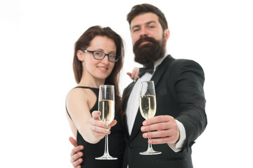 Family celebrate holiday. Happy holiday celebration. Wedding corporate party or other holidays. Anniversary and family holiday. Handsome man and elegant woman hold champagne glasses. Cheers concept