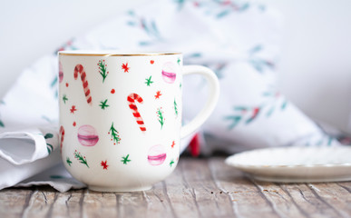 closeup of ceramic cup on wood table