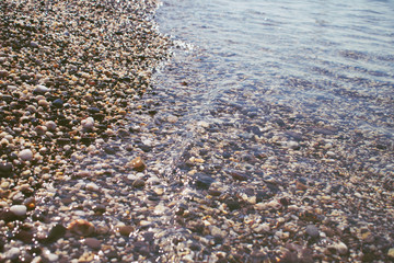 Background texture of wet beautiful sea stones