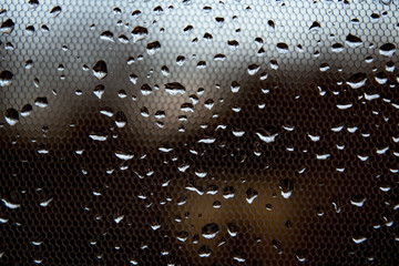 small drops of water on the glass, the concept of rainy weather