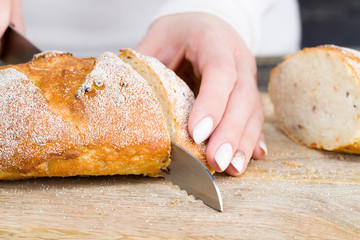 cut bread hand