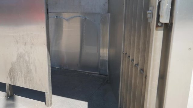 A close-up view of a urinal cabin.