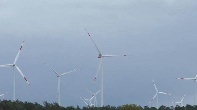 Wind power turbines - Sustainable, environment friendly, renewable energy concept.