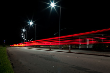 Fototapeta na wymiar Red Car Trails at Night