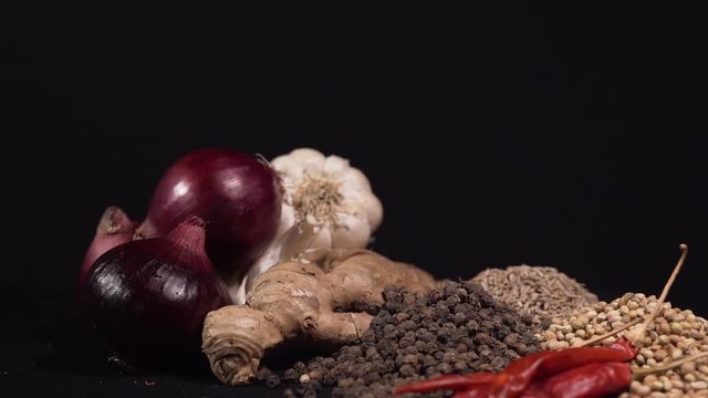A big scenic close-up collection of famous delicious Indian spices seeds like pepper, cumin, ginger, chili. Studio, collection, pictorial, eat concept.