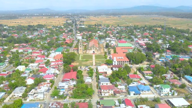 Aerial, panoramic view of the city of paoay with its beautiful iglesia located in the center