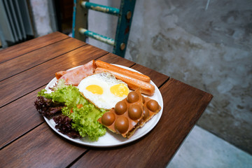 Big breakfast on a wooden table