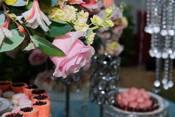 Close up of pink rose at wedding party