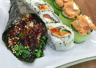 Salmon Temaki , sushu rolls and joe on a table - Japanese Food