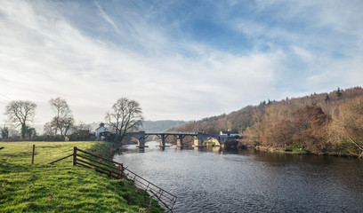 Fototapeta na wymiar Historic Toll Bridge Spanning River Wye in UK