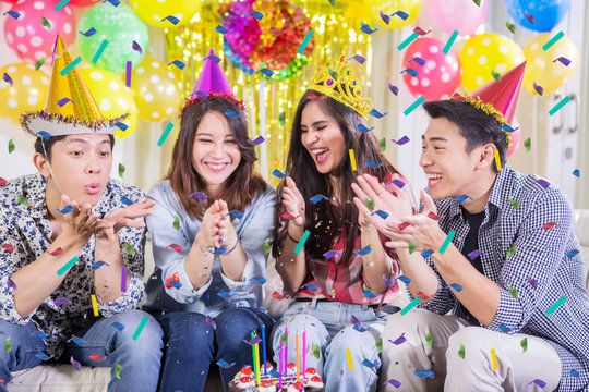 Young people celebrating a birthday party