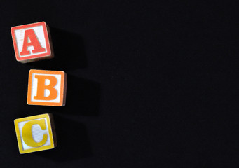 A B C wooden blocks with copy space