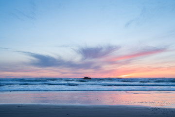 Fototapeta na wymiar View of Colorful Sunset Over The PortLand Ocean