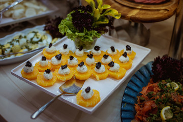 cheese snack with orange and prunes