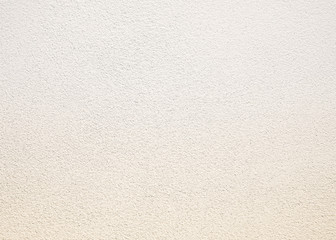 White cement texture plastered stucco wall painted fade background.	