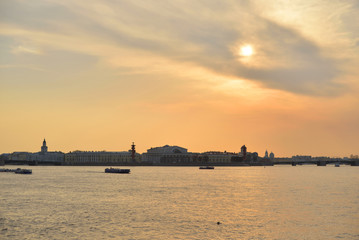 Naklejka premium View of the Neva river and Vasilievsky island at sunset.