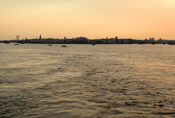 View of the Neva river and Vasilievsky island at sunset.