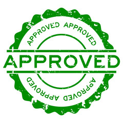 Grunge green approved word round rubber seal stamp on white background