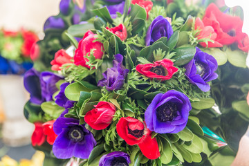 Fototapeta na wymiar Bouquet of red and purple flowers. Flower shop