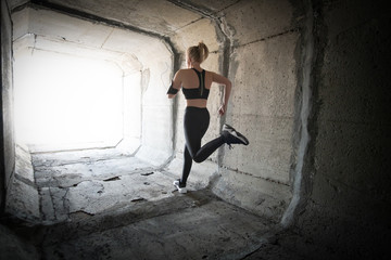 Run to the goal. Healthy lifestyle sports woman running on city streets.