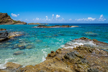 Ocean surf on the rocky beach