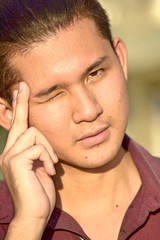 Fototapeta premium Handsome Filipino Male Winking
