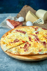 Slice of hot pizza large cheese lunch or dinner crust seafood meat topping sauce. with bell pepper...