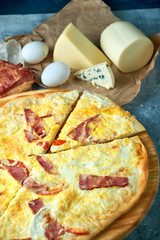 Slice of hot pizza large cheese lunch or dinner crust seafood meat topping sauce. with bell pepper...