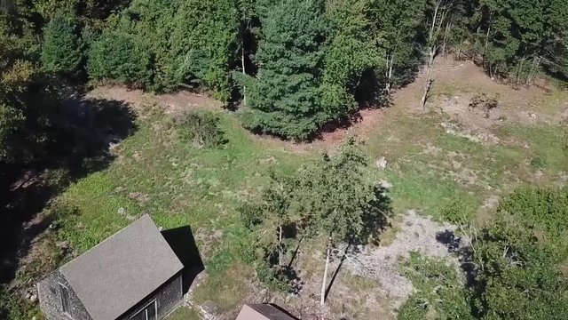 Aerial Shot of a New England country barn landscape drone footage.