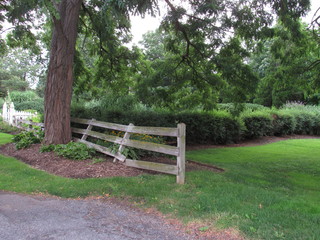 Leaning fence in a park