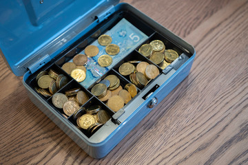 Cash box with coins and notes to keep Petty Cash secure