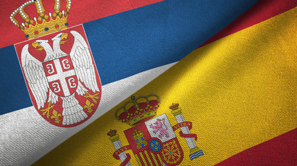 Serbia and Spain two flags textile cloth, fabric texture